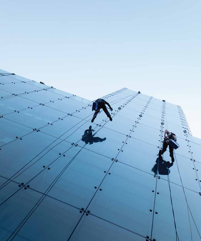 Rope-access technicians working on a building façade, supplied Prope image