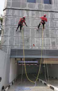 Rope-access technicians cleaning the Parliament House façade, supplied Prope project image